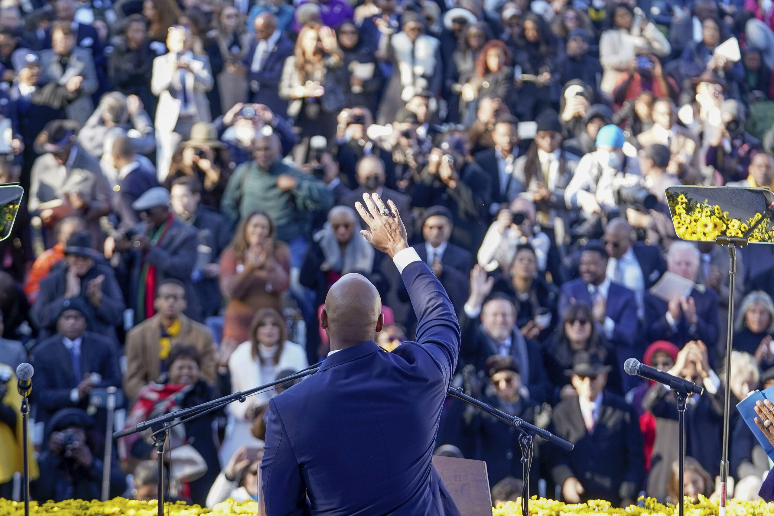Governor Wes Moore waves to those attending his Inauguration at the State Capitol in Annapolis, Maryland, Jan. 18, 2023.