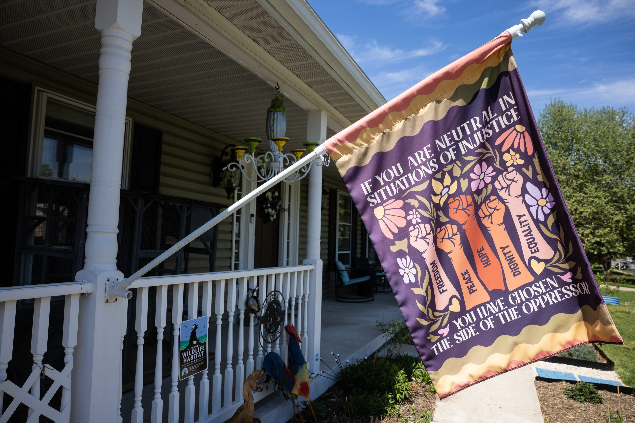A flag is seen outside of Fram's home. The fact that Fram is trans is, she says, “the 17th most interesting thing about” her.
